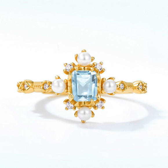 Sky Blue Topaz  and Pearl  Ring - حجر التوباز الازرق